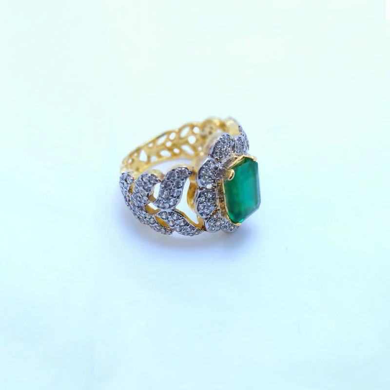 Silver-Ring-with-Emerald-cut-and-Zircons-Gold-Plated.-925-Silver1.webp
